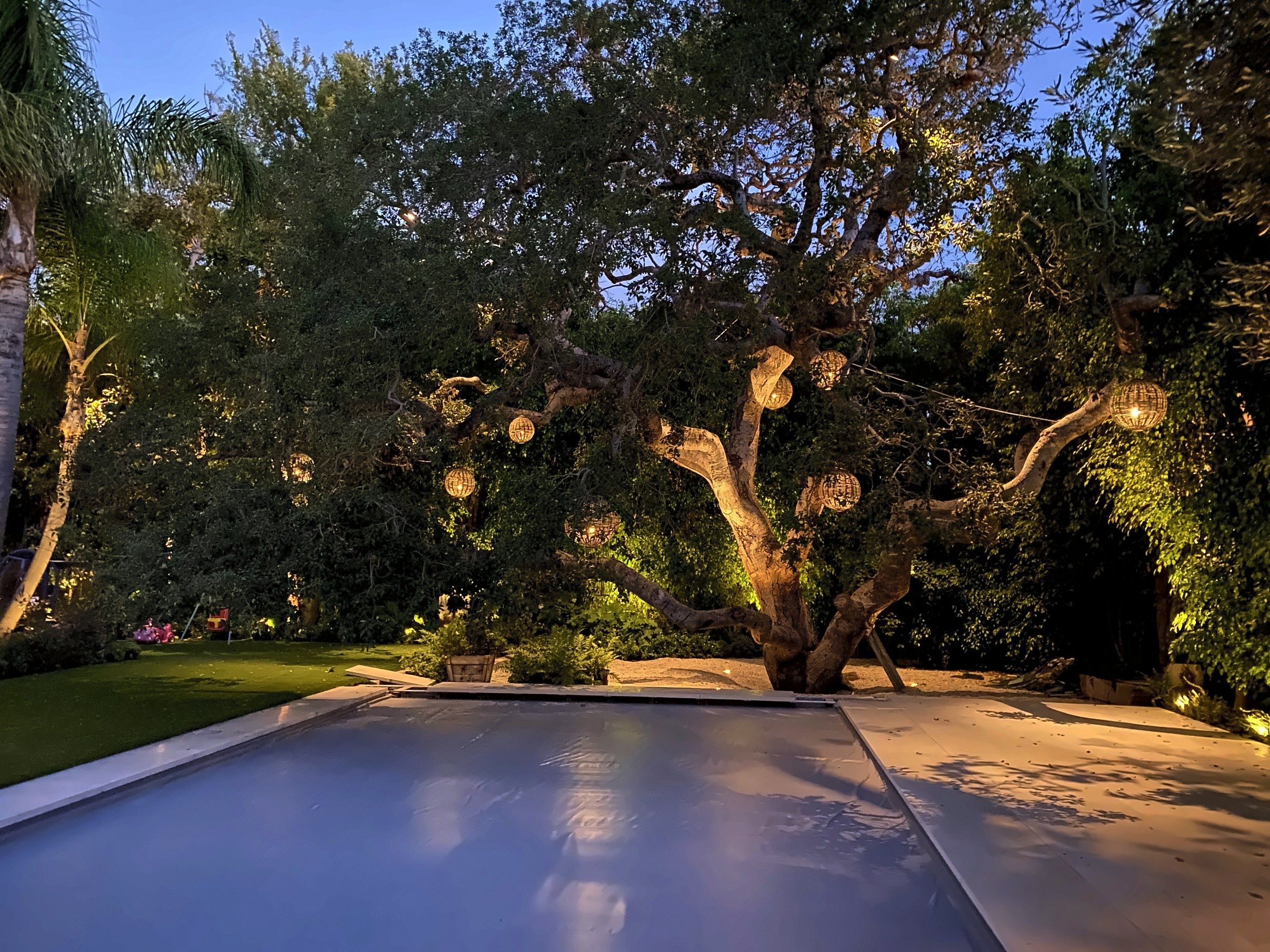 Pool lantern hung oak dusk